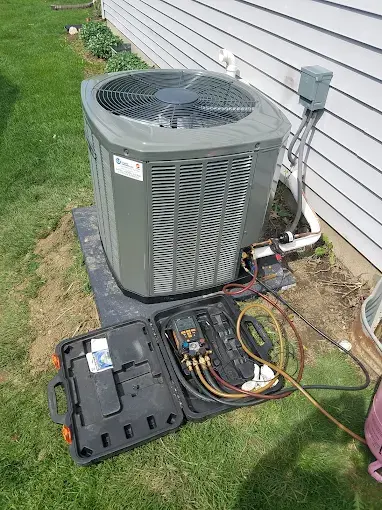 Outdoor AC condenser unit on a Peoria residential property, the type of equipment we repair and replace